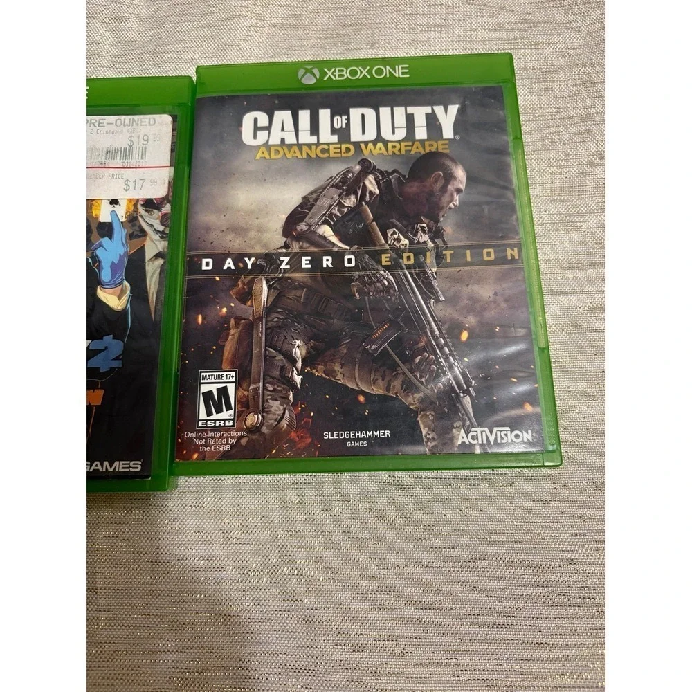 three Xbox One video games Payday, call of duty ,madden